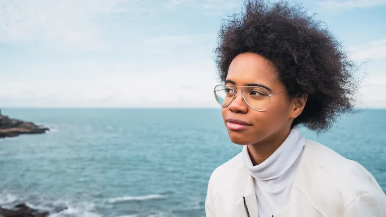 Woman finding calm by the Caribbean Sea — anxiety and depression therapy in the U.S. Virgin Islands