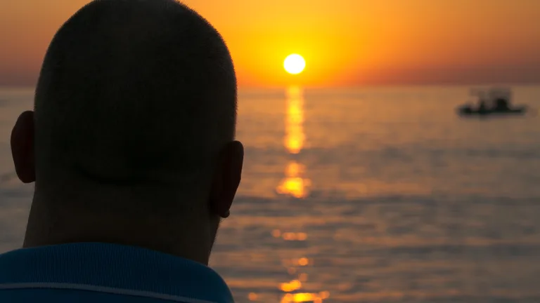 Man on the water at sunrise — substance use counseling in the U.S. Virgin Islands